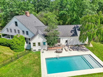 a view of house with garden
