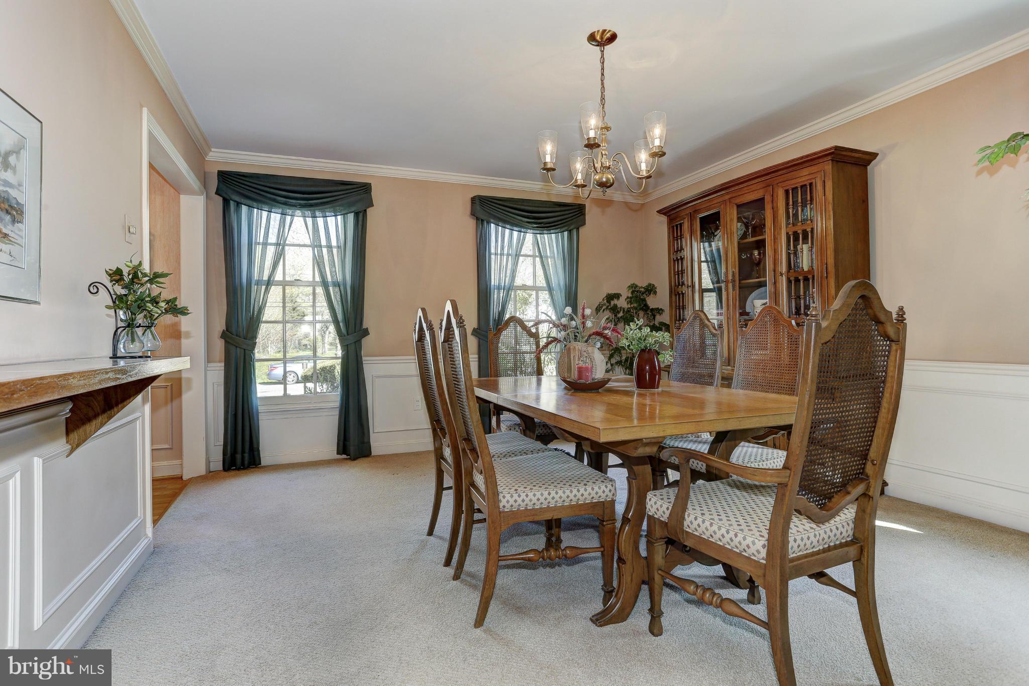 7918 Ruxway Road Baltimore, MD 21204 - Photo 13 of 30 Dining Room with wainscoting ,hardwd under carpet