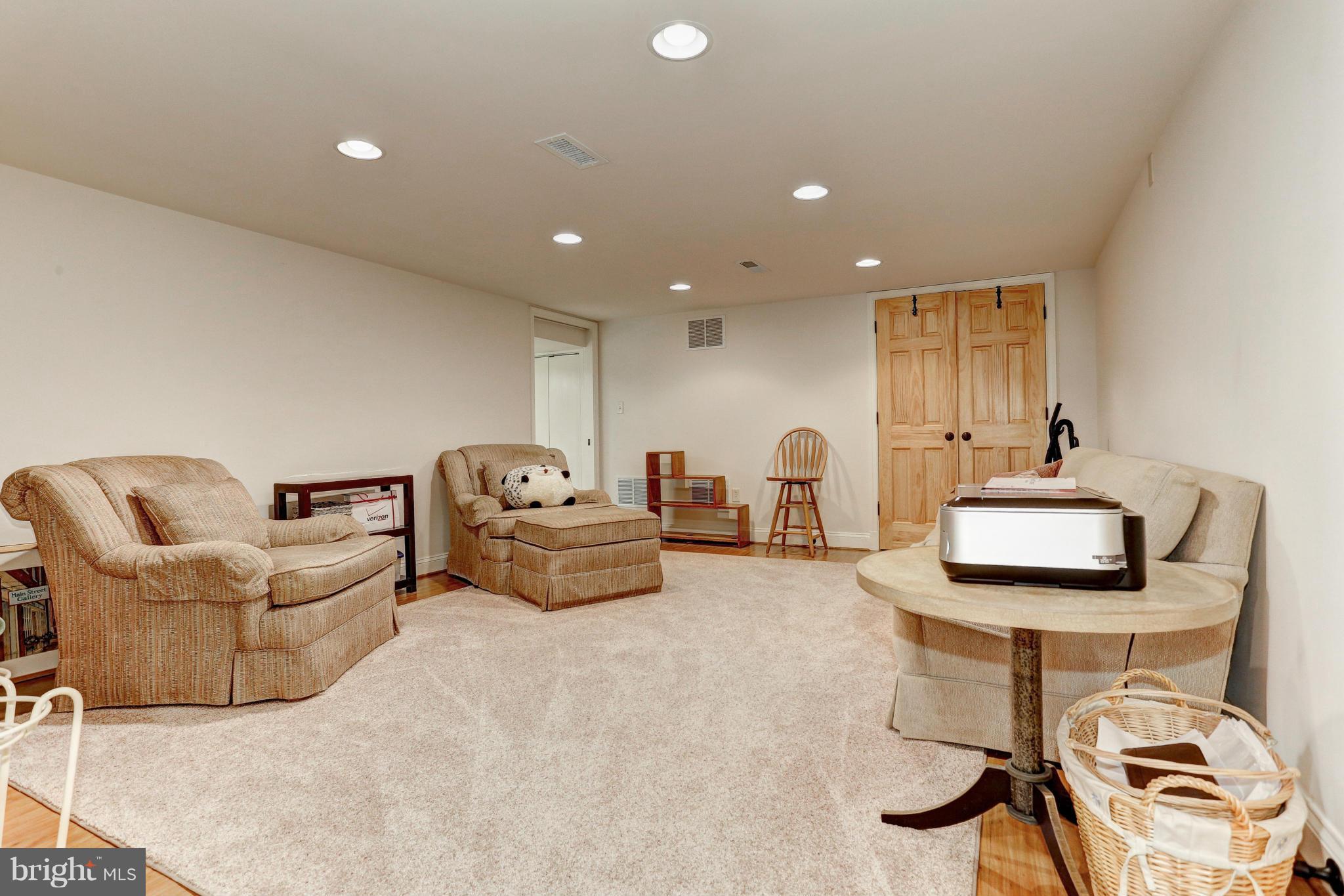 7918 Ruxway Road Baltimore, MD 21204 - Photo 25 of 30 Lower level Rec rm. Recessed lighting.