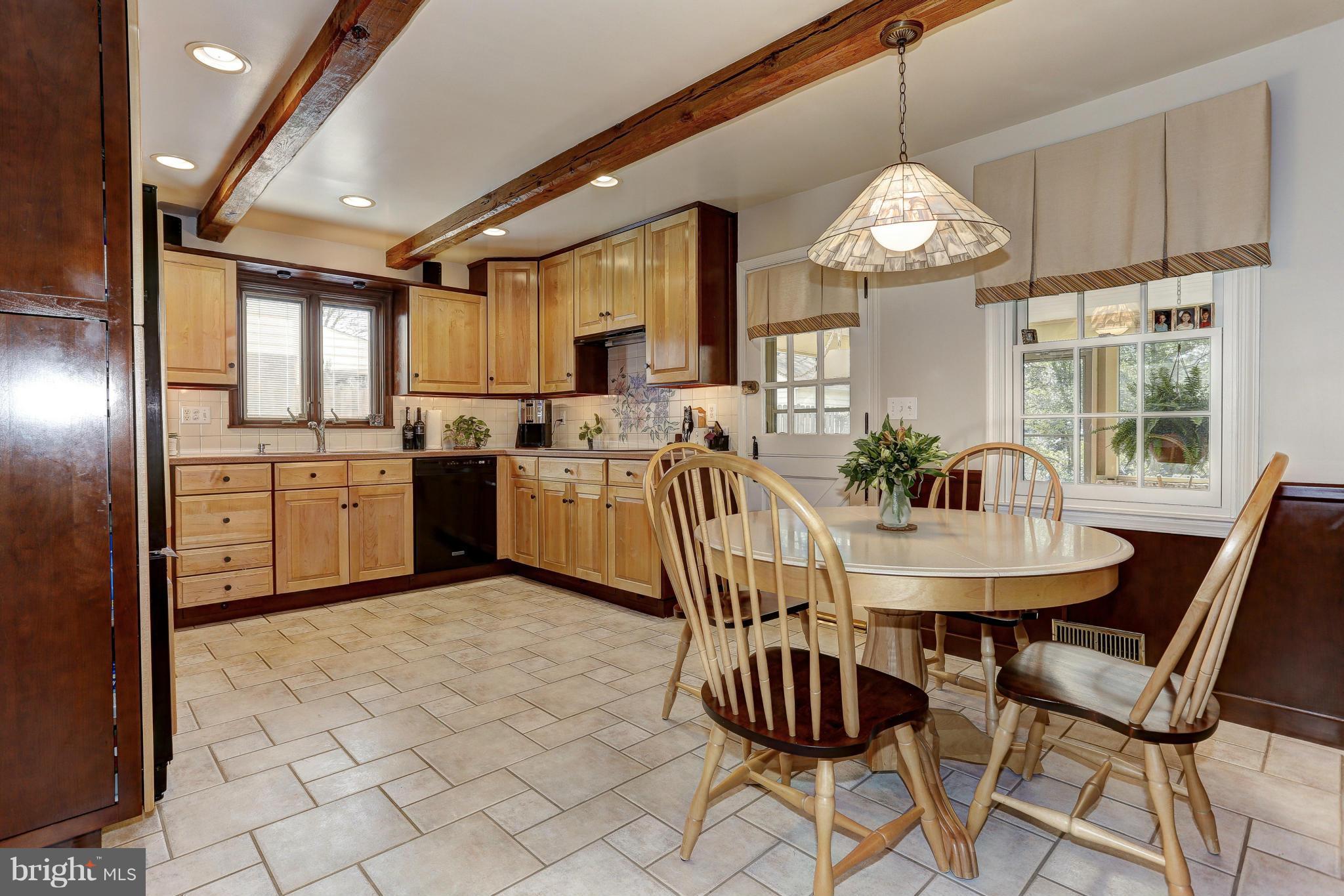 7918 Ruxway Road Baltimore, MD 21204 - Photo 6 of 30 Custom-designed maple and cherry kitchen.