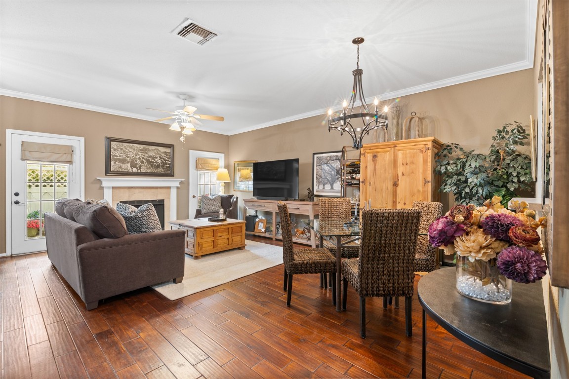 6000 Reims Road, Unit 2307 Houston, TX 77036 - Photo 7 of 26 This inviting living area features tasteful lighting and a fireplace, with patio doors that allow natural light and access to your private patio.