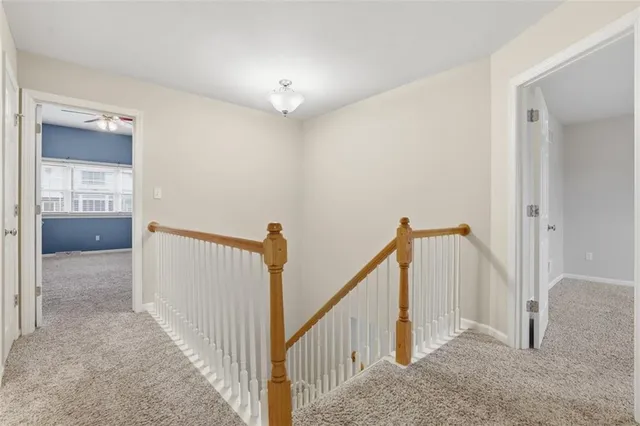 a bedroom with a large bed and a couch