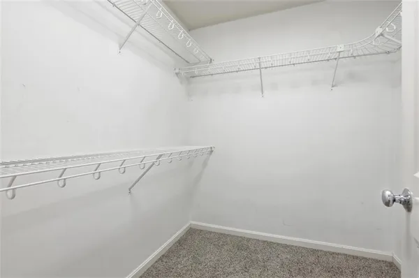 a view of a room with racks on the wall