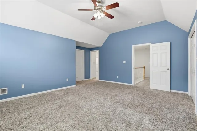 an empty room with a empty space and window