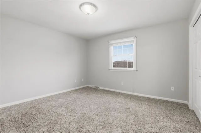 a bathroom with a sink toilet and vanity