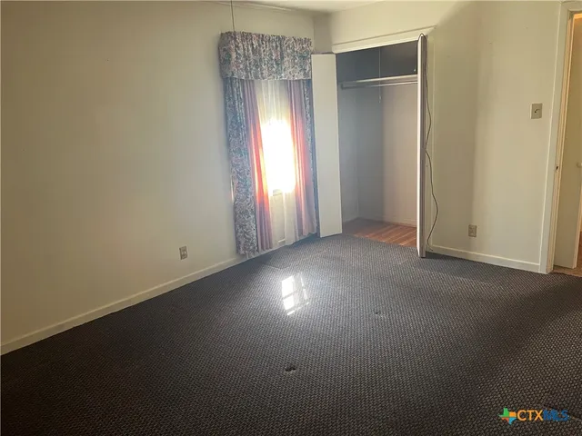 a view of empty room with window