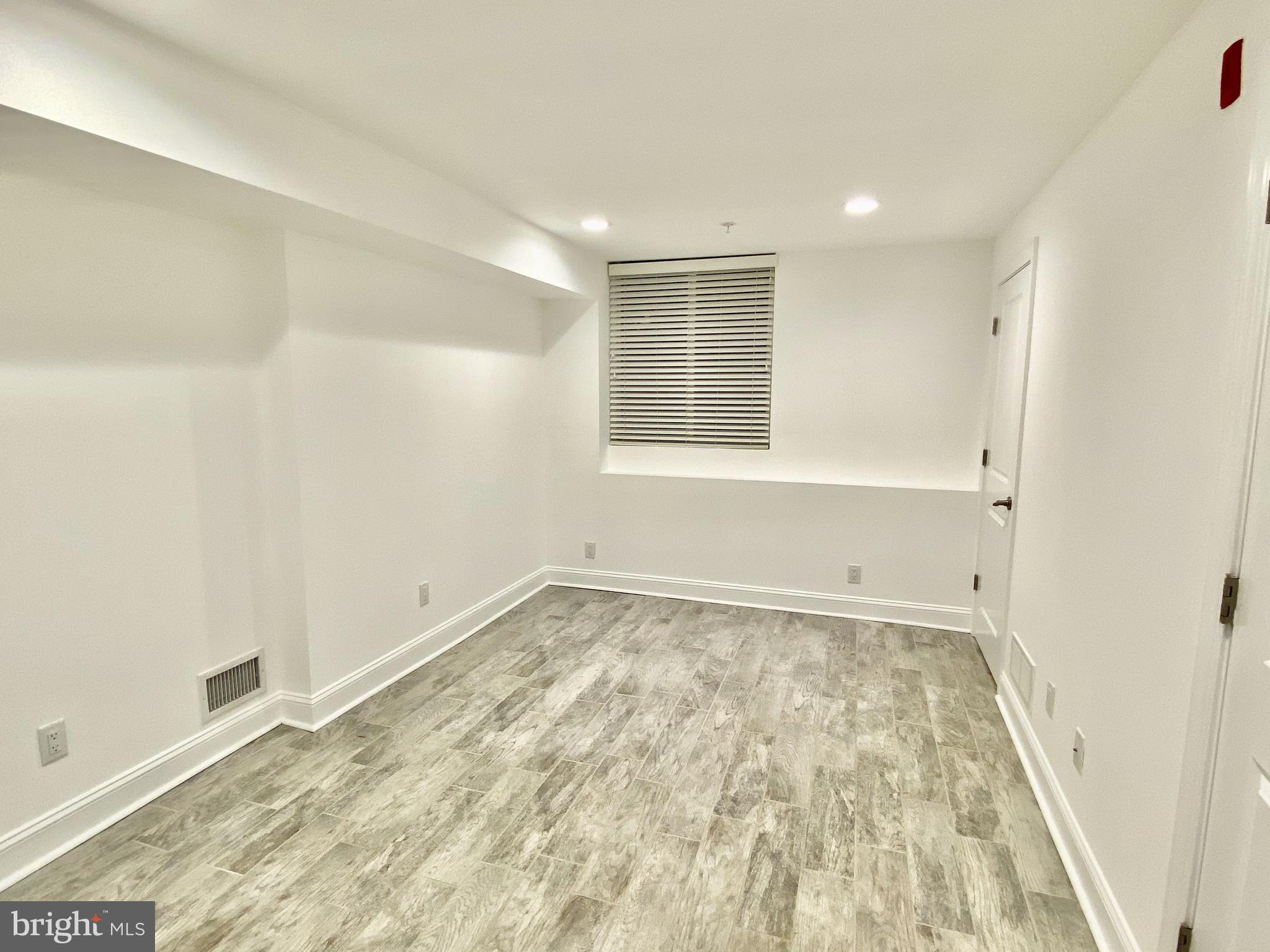 1640 Jackson Street Philadelphia, PA 19145 - Photo 15 of 27 a view of an empty room and a window