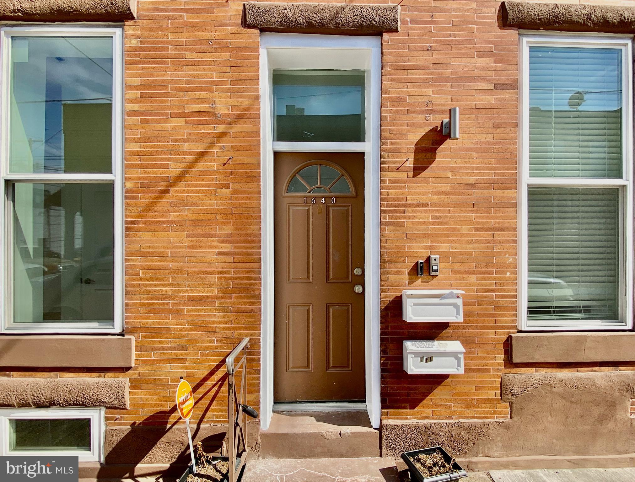 1640 Jackson Street Philadelphia, PA 19145 - Photo 25 of 27 a front view of a house with a window