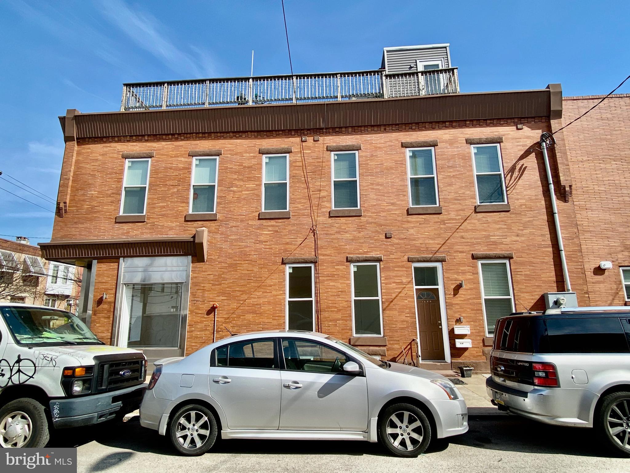 1640 Jackson Street Philadelphia, PA 19145 - Photo 26 of 27 a car parked in front of a house