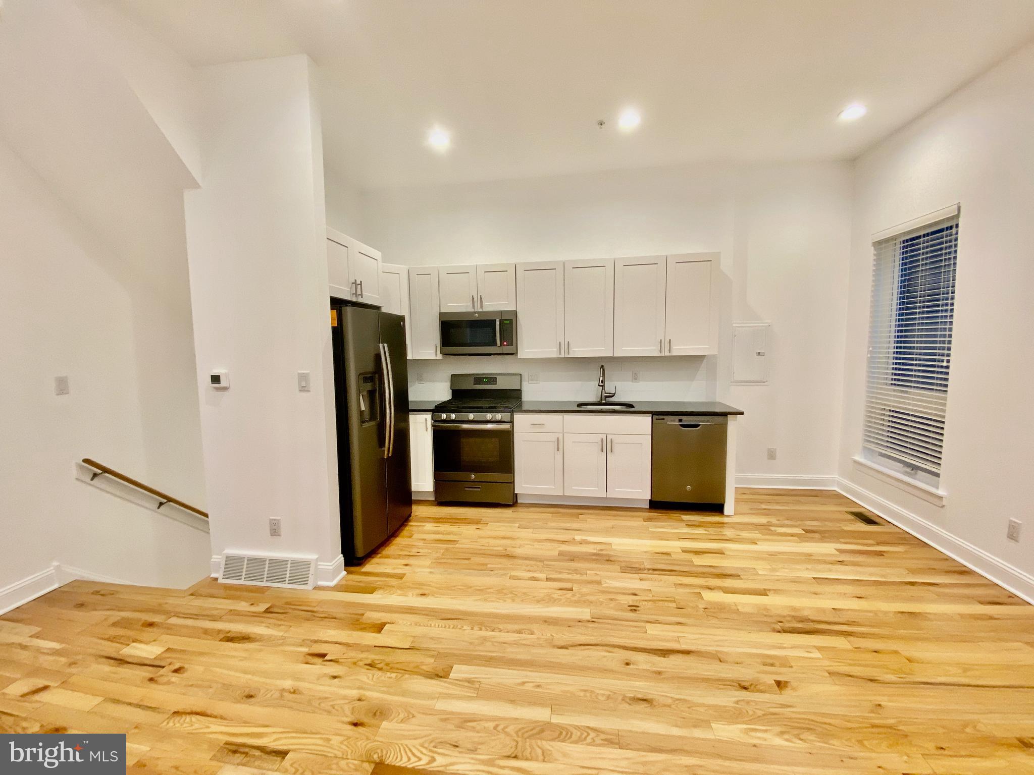 1640 Jackson Street Philadelphia, PA 19145 - Photo 5 of 27 a view of kitchen with wooden floor