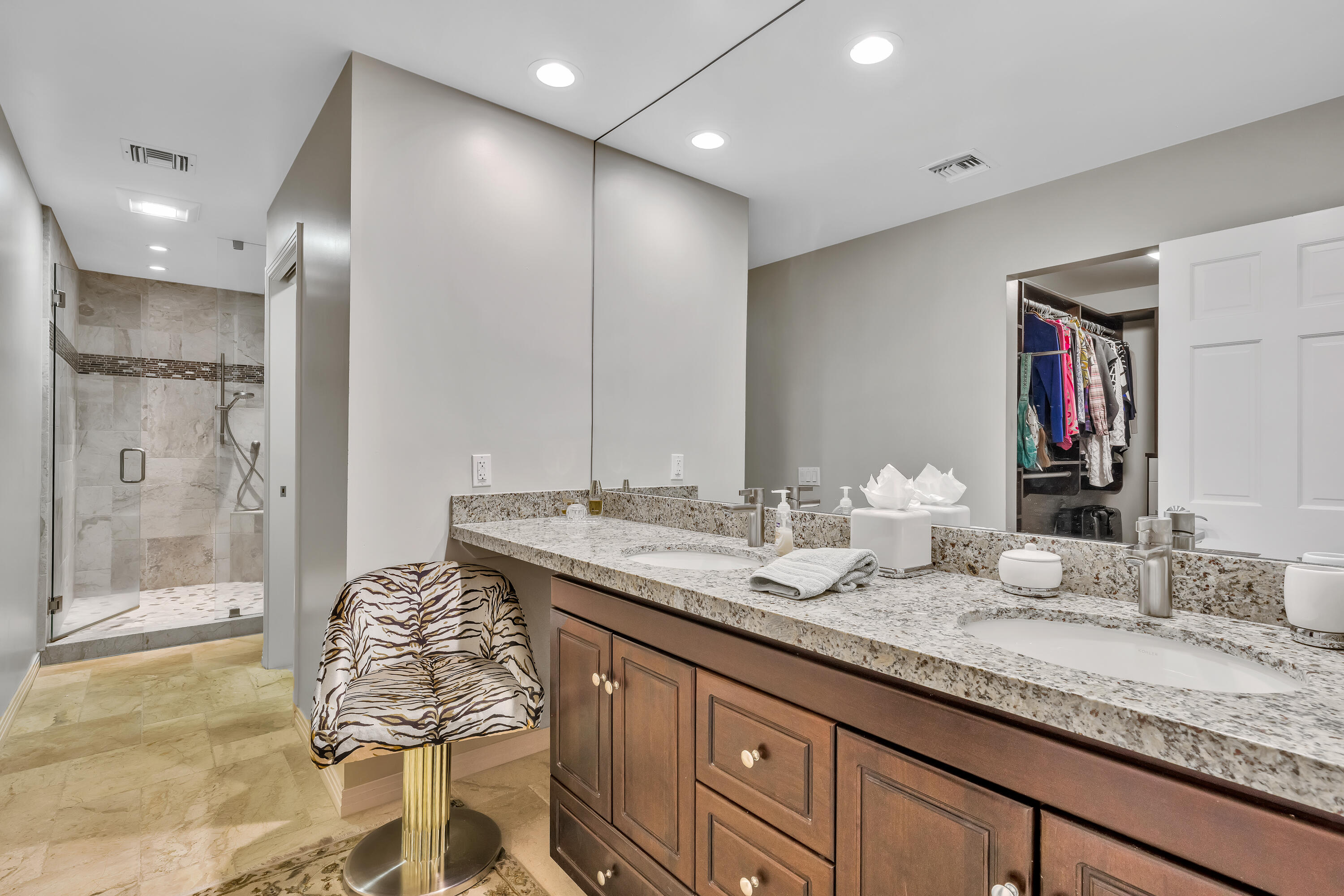 73005 Haystack Road Palm Desert, CA 92260 - Photo 28 of 45 a bathroom with a granite countertop sink and a mirror