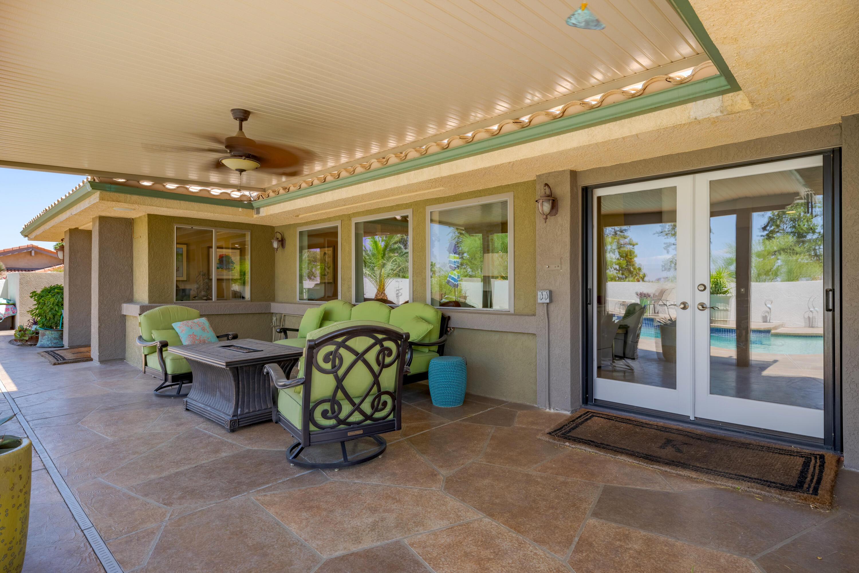 73005 Haystack Road Palm Desert, CA 92260 - Photo 39 of 45 a lobby with furniture and floor to ceiling window
