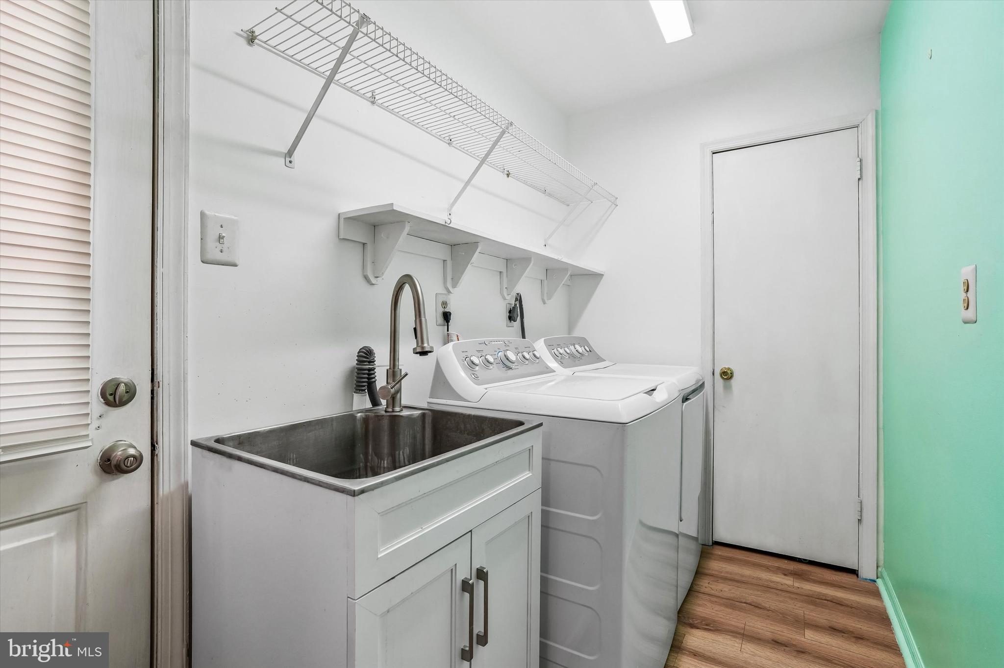 115 Pleasant Hill Road Cheltenham, PA 19012 - Photo 14 of 39 Laundry room off of kitchen with back door