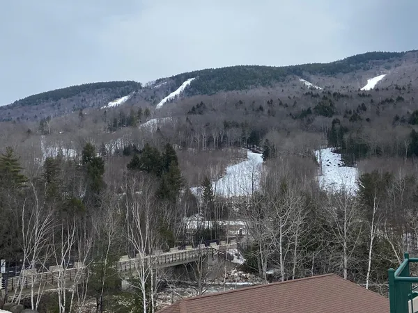 $489,000 | 48 Cooper Memorial Drive, Unit 405, Lincoln, NH 03251