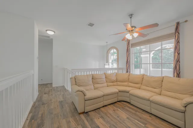 a view of a hallway with a white walls