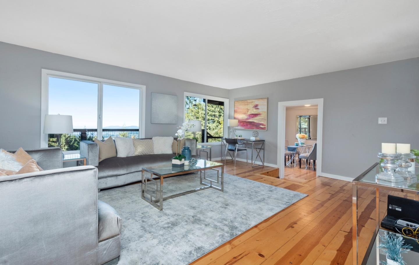 14826 Skyline Boulevard, Unit 3 Woodside, CA 94062 - Photo 3 of 13 a living room with furniture and wooden floor