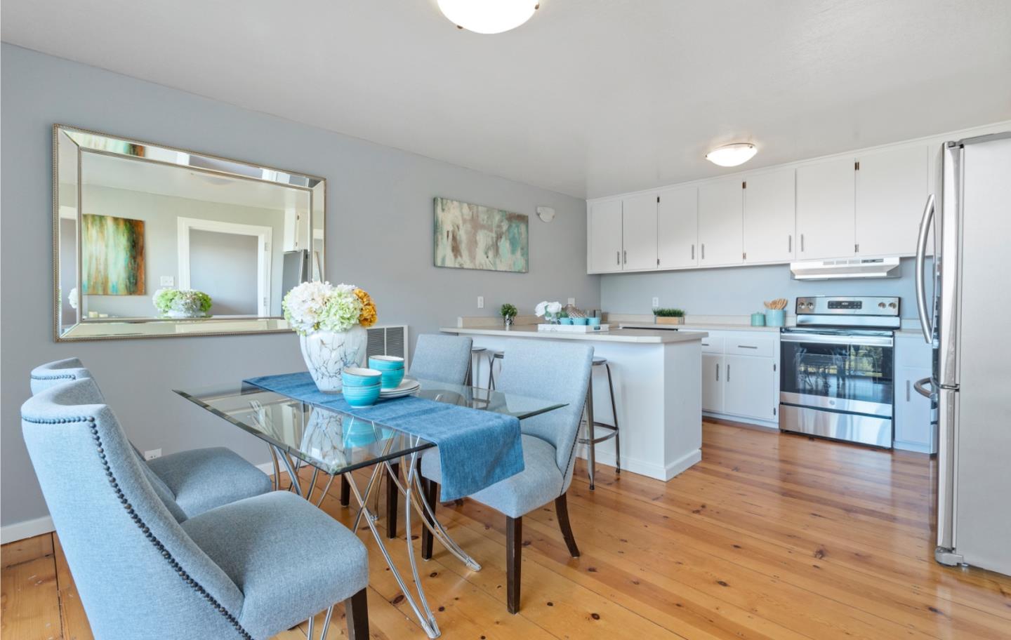14826 Skyline Boulevard, Unit 3 Woodside, CA 94062 - Photo 5 of 13 a view of a dining room with furniture and wooden floor