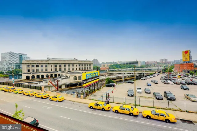 a view of swimming pool with seating area