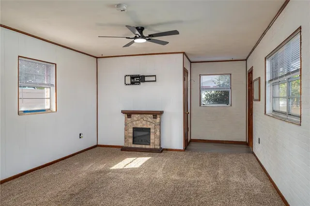 a view of empty room with windows
