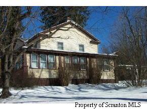 131 Rt 407 Nicholson, PA 18446 - Photo 1 of 1 a view of a house with a window