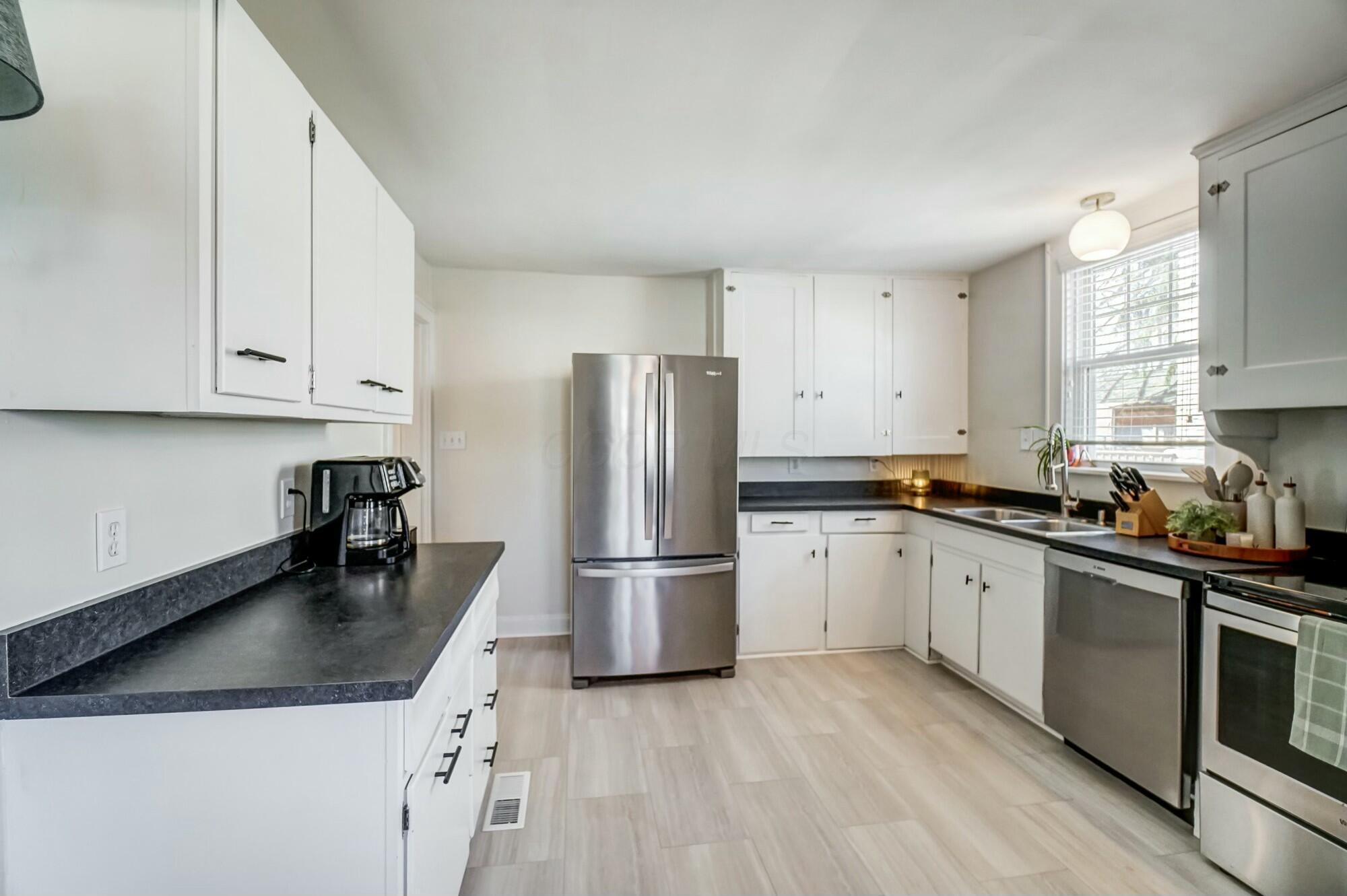 533 East Torrence Road Columbus, OH 43214 - Photo 13 of 64 Updated Kitchen with new floor...