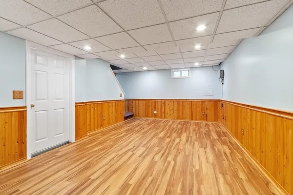 a view of hallway with a wooden floor