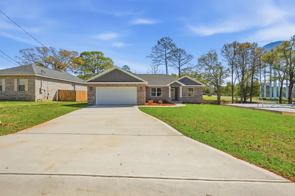 front view of house with a yard