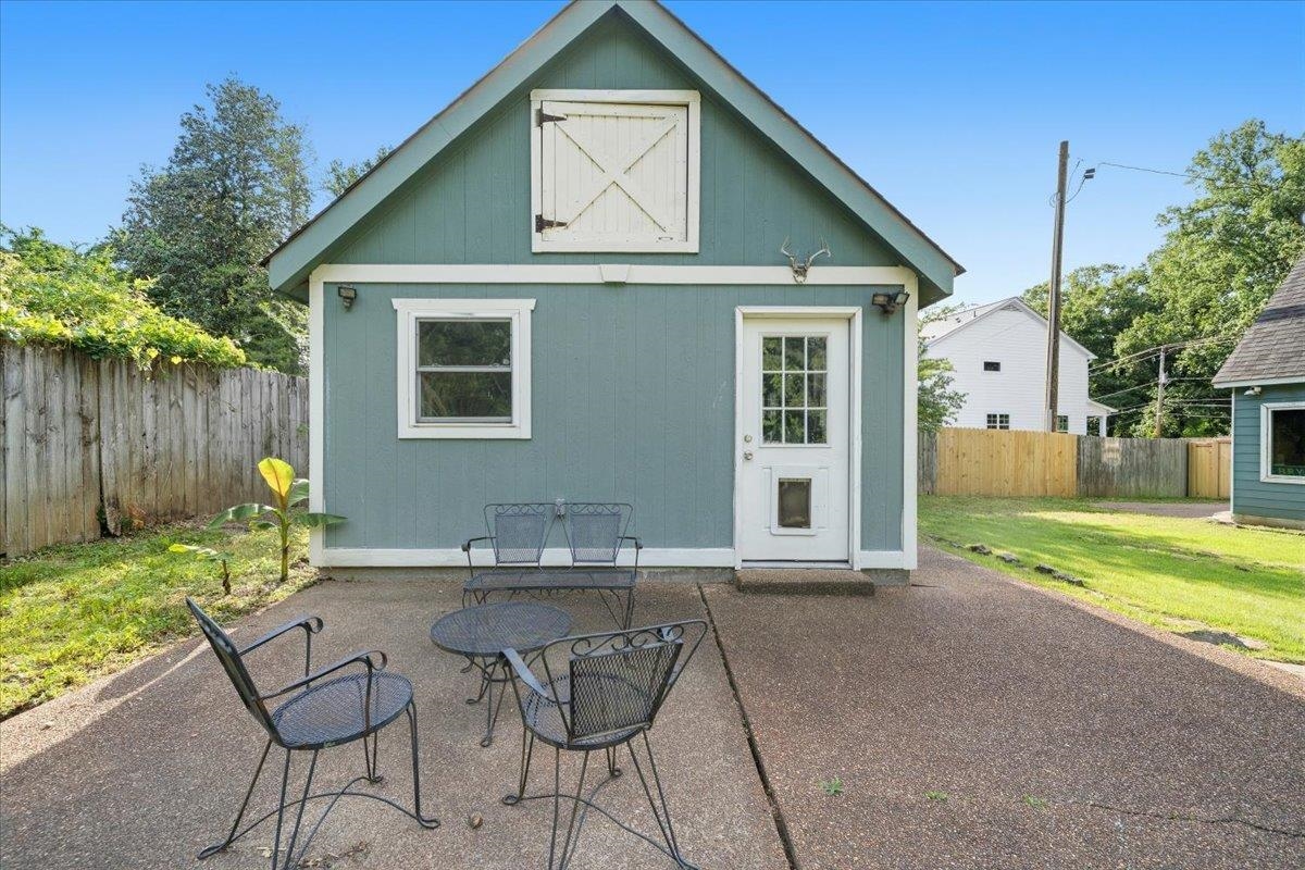 7226 Cedar Road Bartlett, TN 38135 - Photo 27 of 29 a view of a house with backyard and sitting area