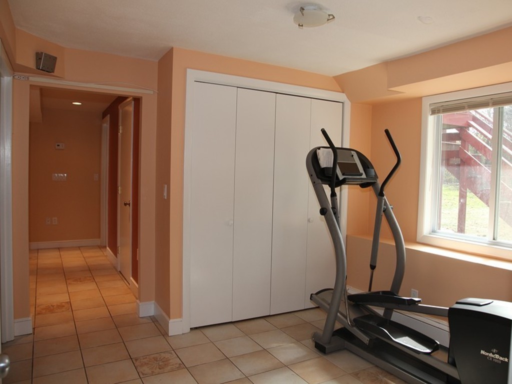 155 Noanett Road Needham, MA 02494 - Photo 12 of 18 a view of a room with gym equipment