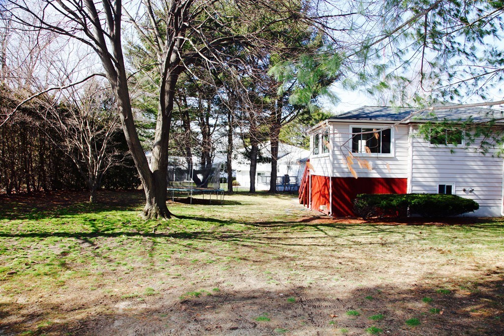 155 Noanett Road Needham, MA 02494 - Photo 18 of 18 a view of house with tree and yard