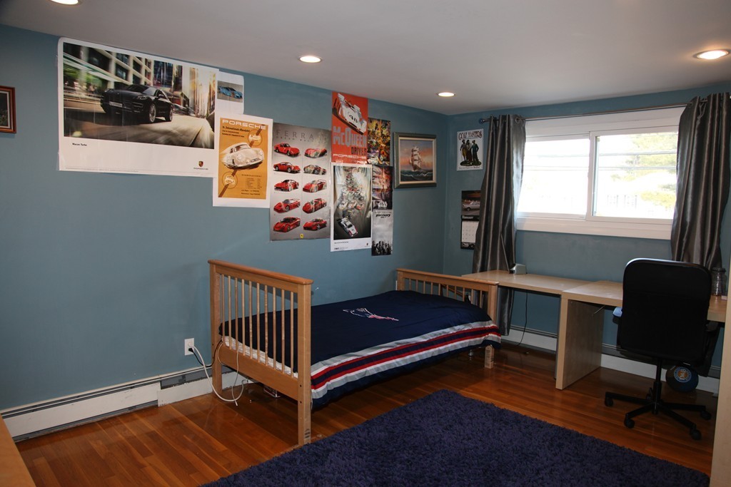 155 Noanett Road Needham, MA 02494 - Photo 8 of 18 a living room with furniture and a window