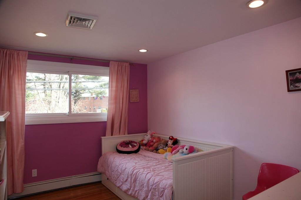 155 Noanett Road Needham, MA 02494 - Photo 9 of 18 a room with furniture and a window