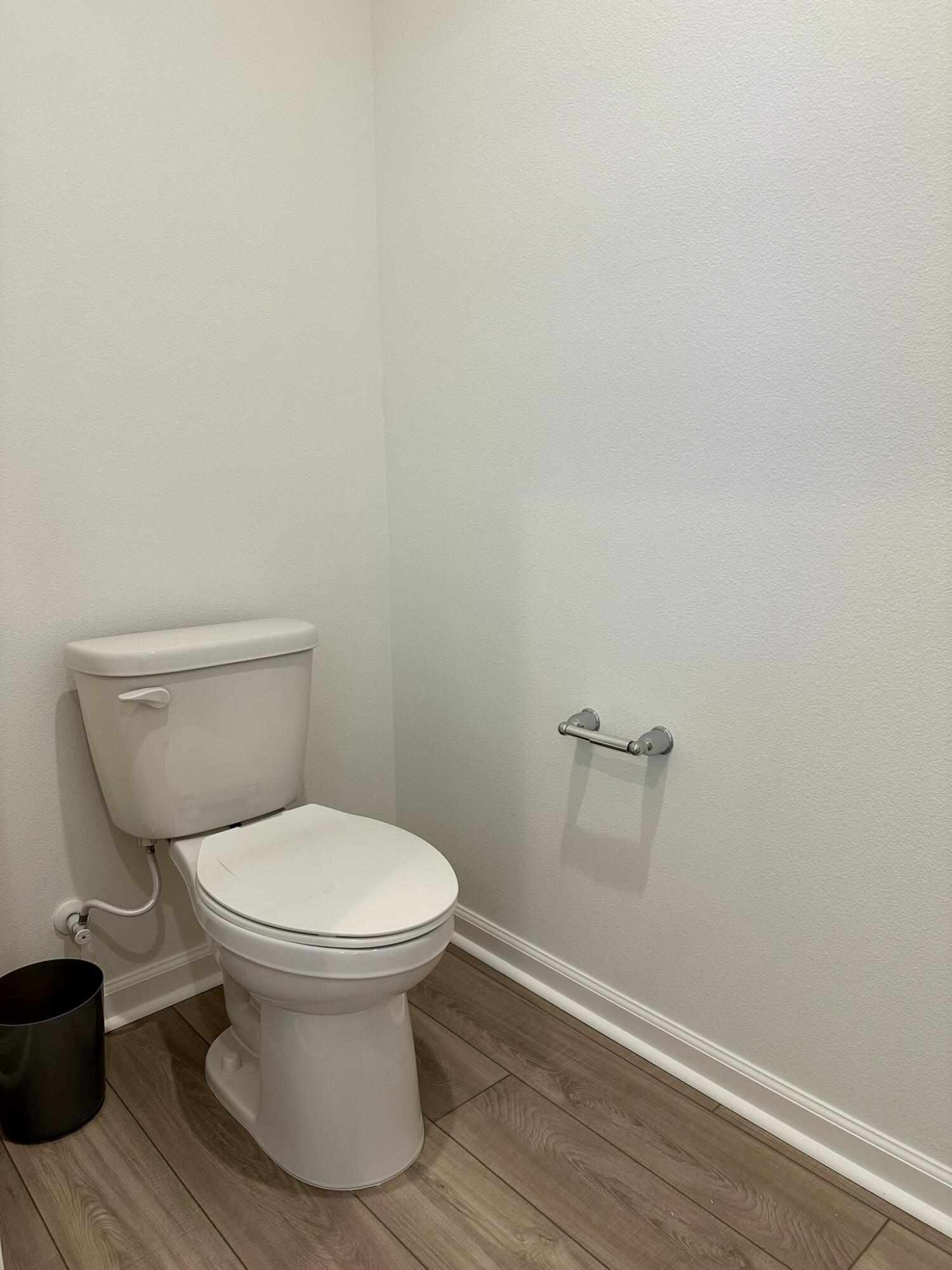 78879 Fortuna Place Palm Desert, CA 92211 - Photo 11 of 25 a white toilet sitting next to a white wall