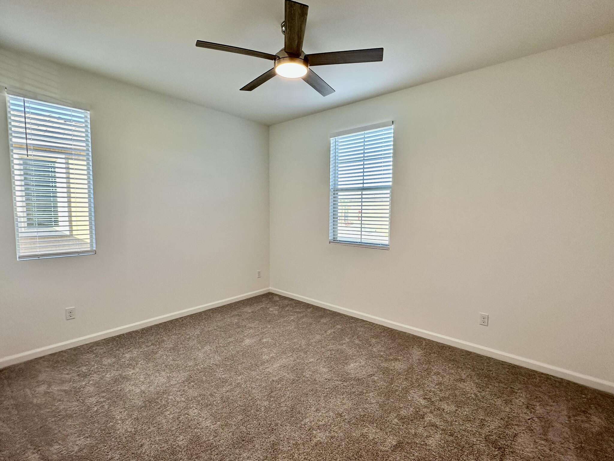 78879 Fortuna Place Palm Desert, CA 92211 - Photo 12 of 25 a view of an empty room with a window