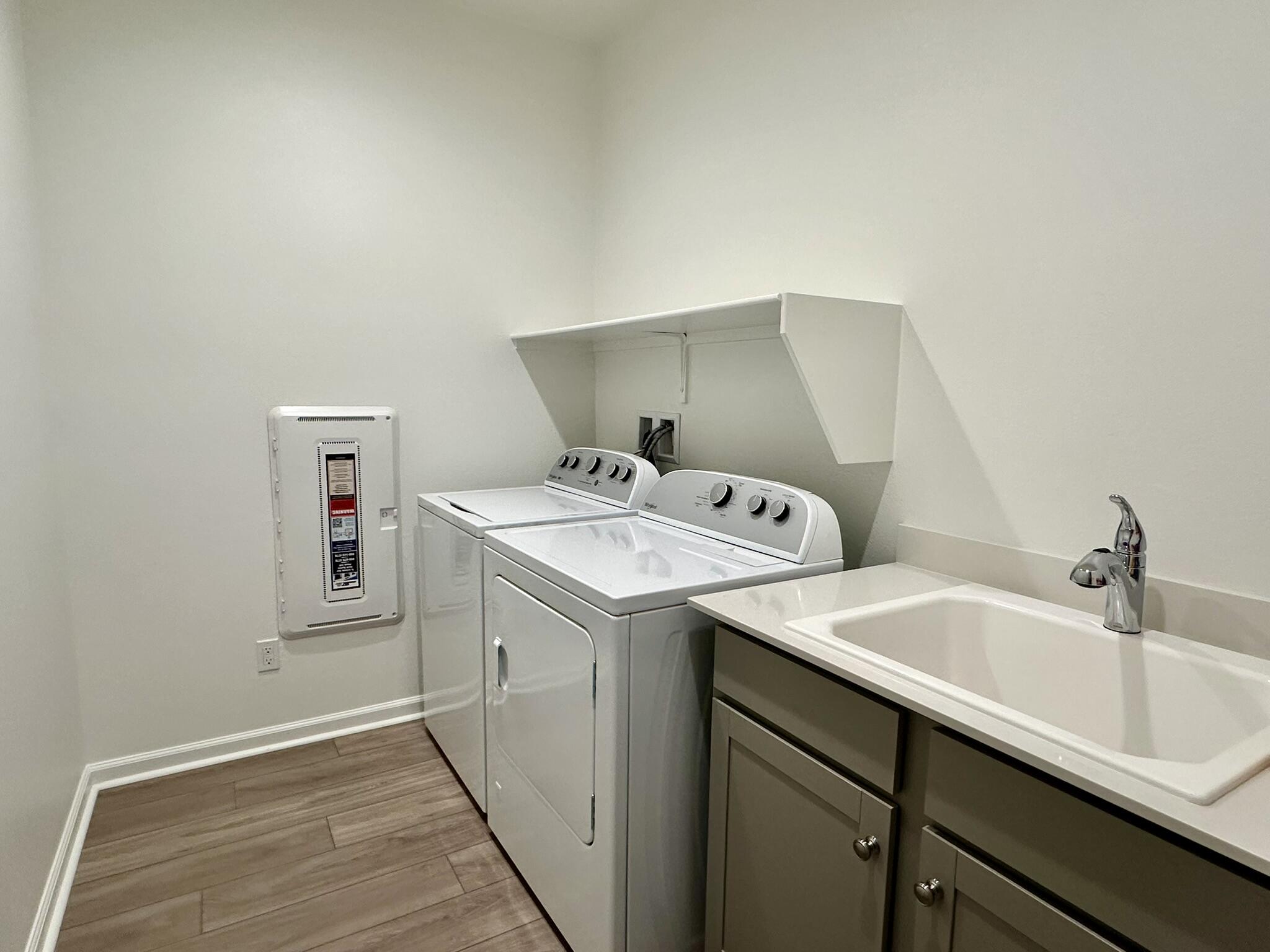78879 Fortuna Place Palm Desert, CA 92211 - Photo 17 of 25 a utility room with dryer and washer