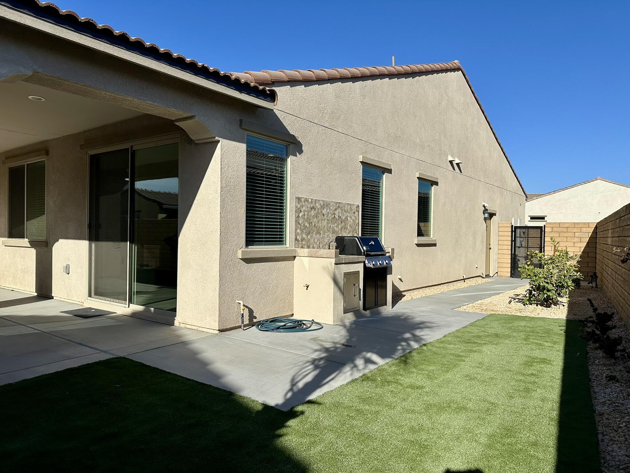 78879 Fortuna Place Palm Desert, CA 92211 - Photo 20 of 25 a view of a backyard of the house
