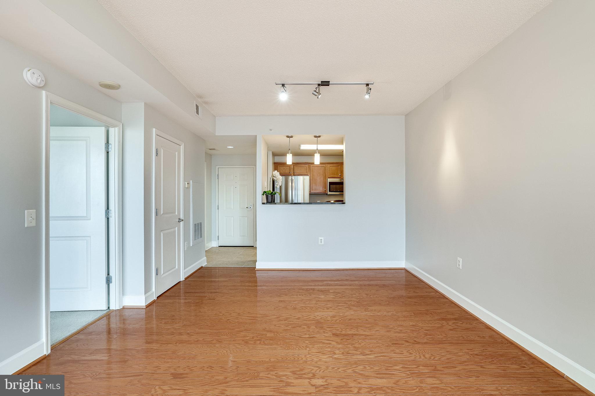 11800 Sunset Hills Road, Unit 1212 Reston, VA 20190 - Photo 15 of 64 Living/Dining area