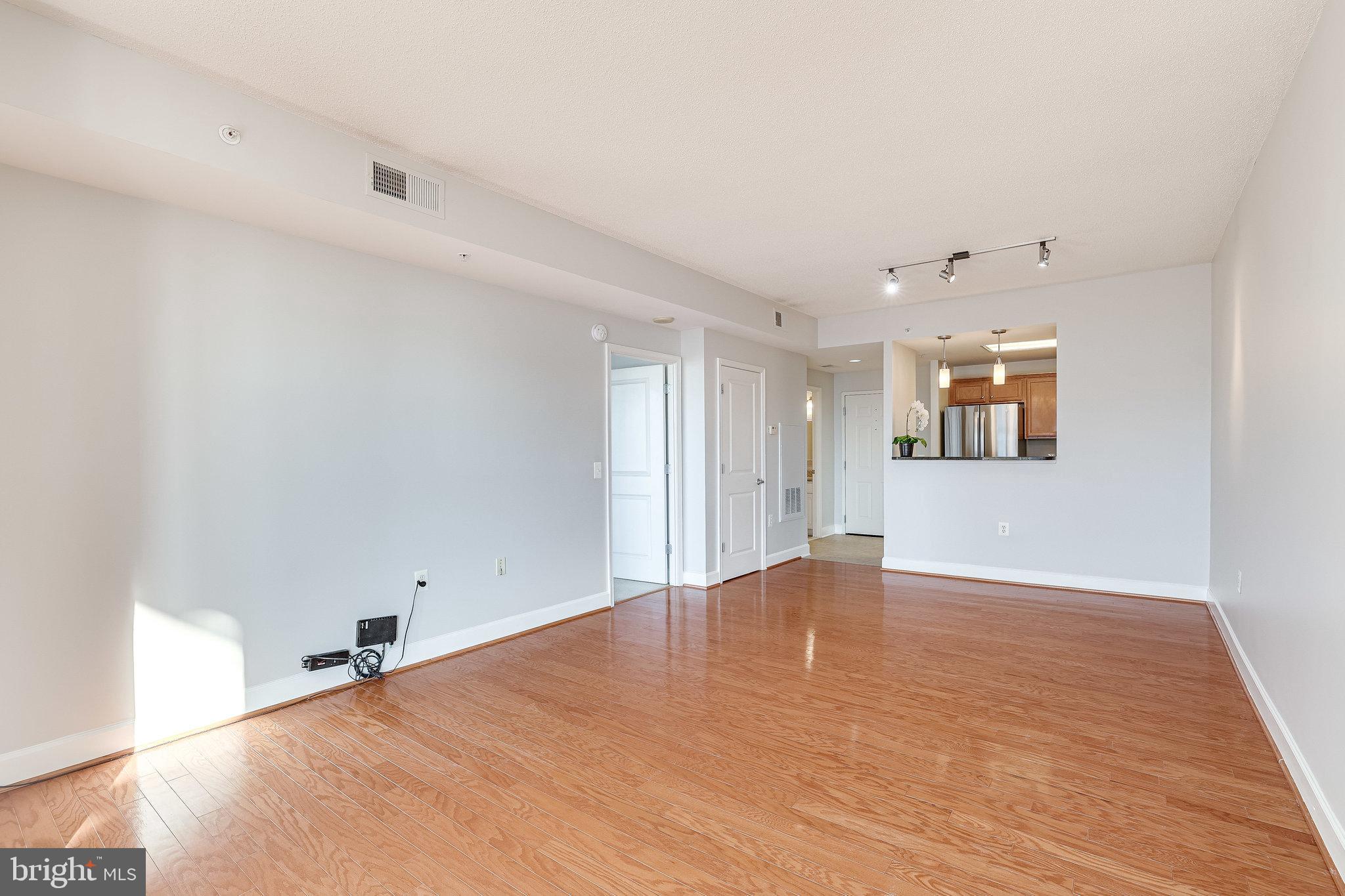 11800 Sunset Hills Road, Unit 1212 Reston, VA 20190 - Photo 19 of 64 Living/Dining areas