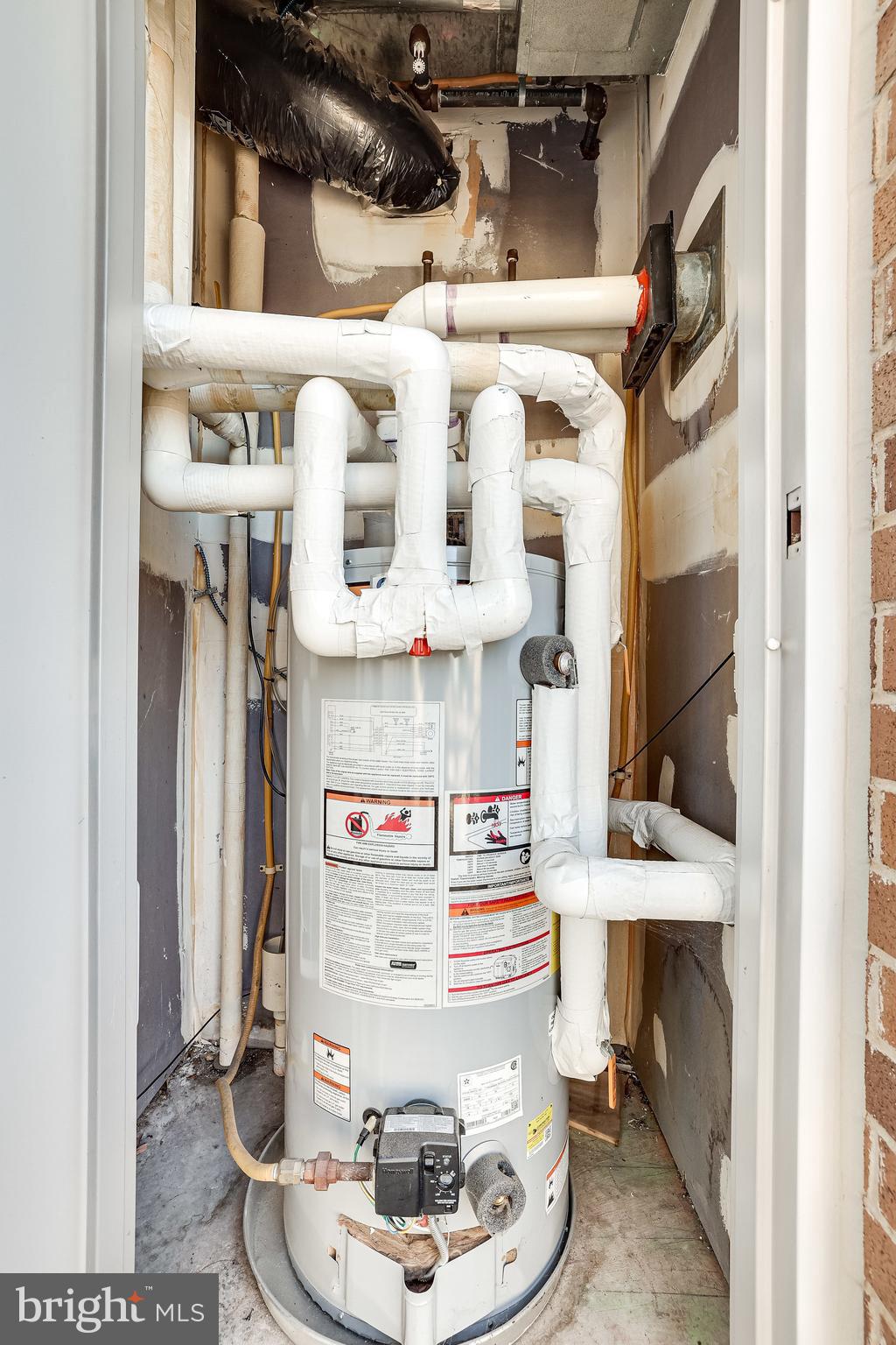 11800 Sunset Hills Road, Unit 1212 Reston, VA 20190 - Photo 38 of 64 Newer Water heater inside utility closet