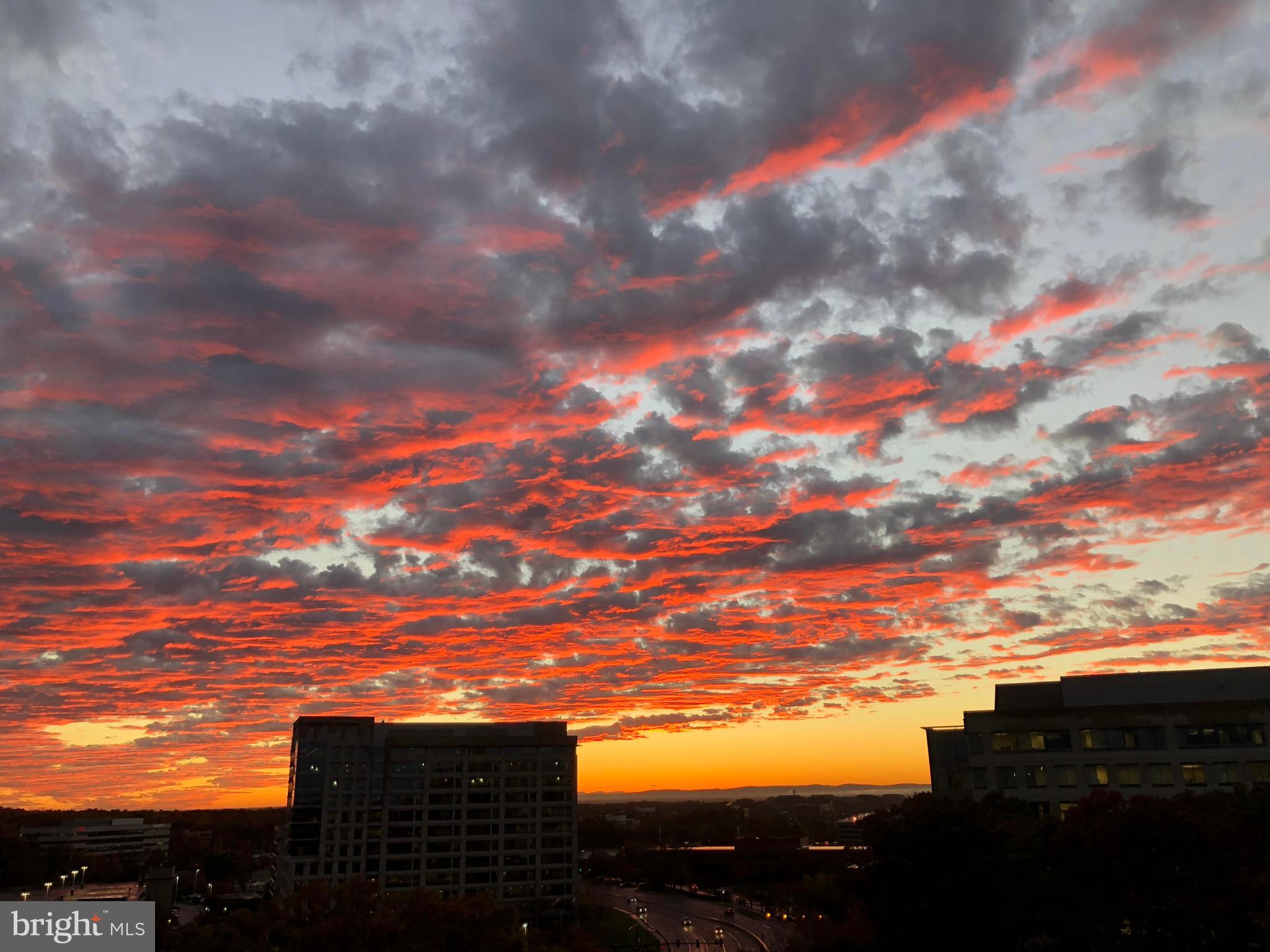 11800 Sunset Hills Road, Unit 1212 Reston, VA 20190 - Photo 41 of 64 Sunset view from the Balcony off the bedroom
