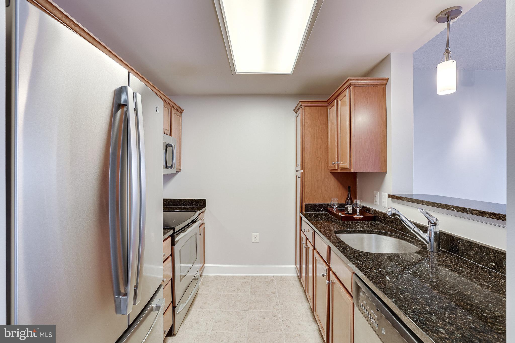 11800 Sunset Hills Road, Unit 1212 Reston, VA 20190 - Photo 8 of 64 Kitchen with never used fridge
