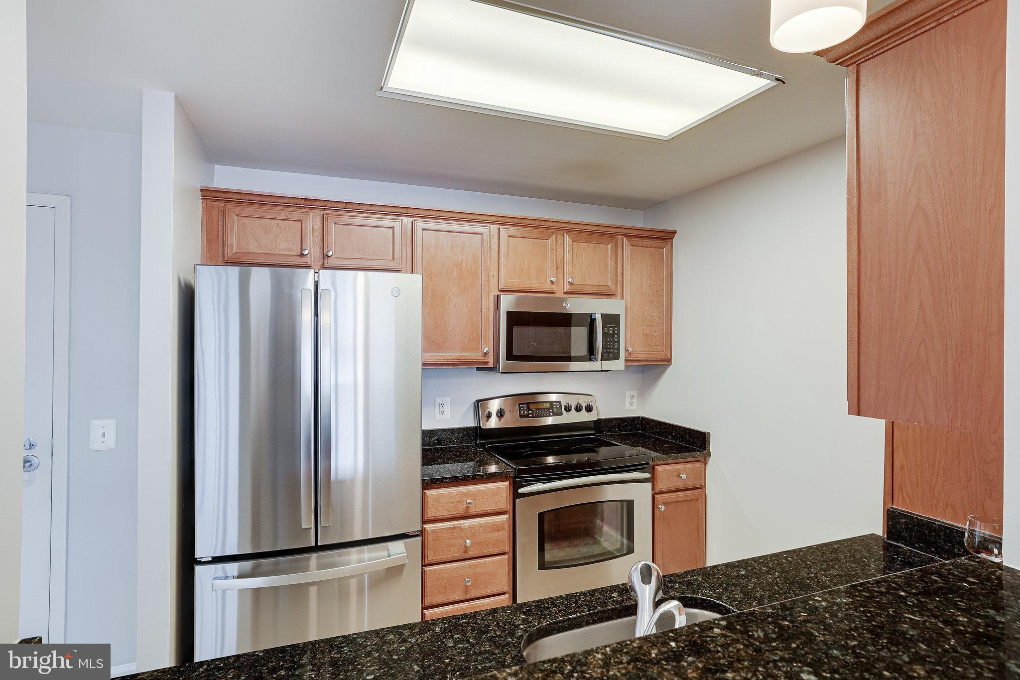 11800 Sunset Hills Road, Unit 1212 Reston, VA 20190 - Photo 10 of 64 Kitchen with never used fridge!