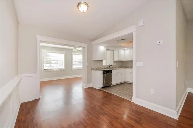 a view of kitchen with wooden floor