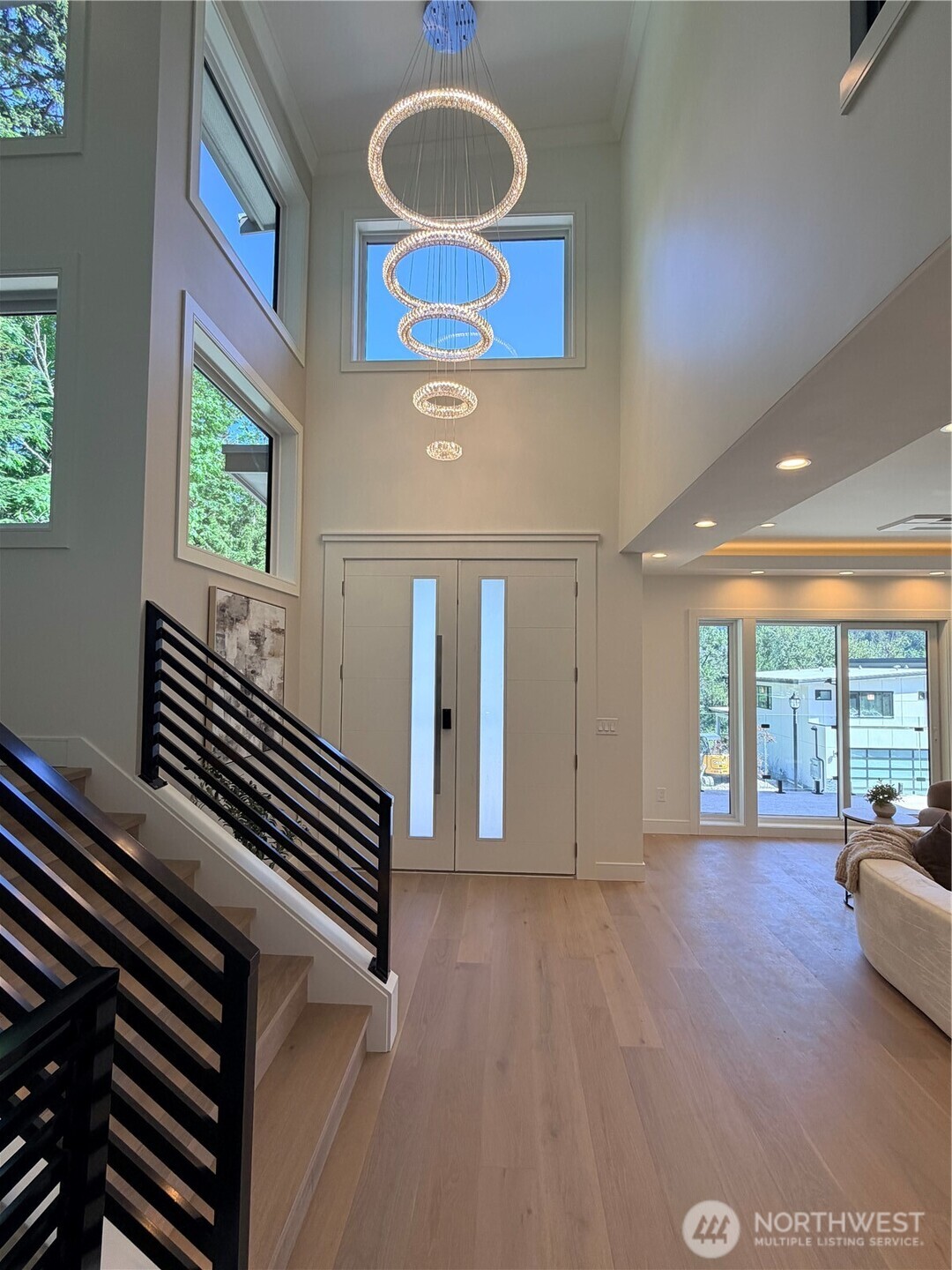 4305 Northeast 26th Court Renton, WA 98059 - Photo 2 of 40 a view of an entryway with wooden floor