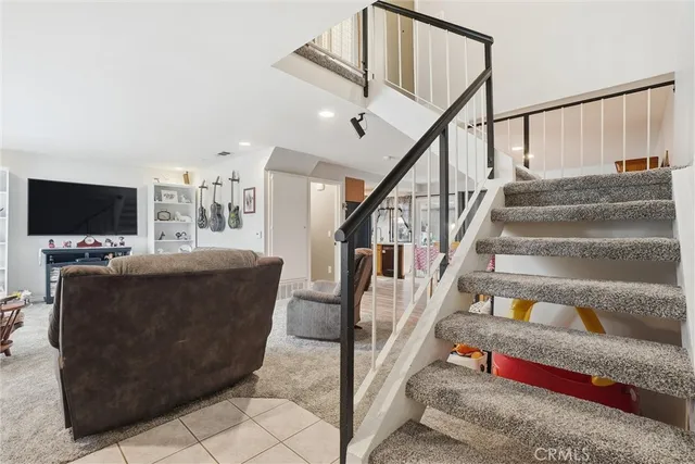 a bathroom with a sink mirror and toilet