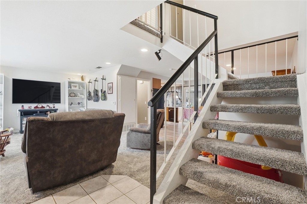 904 Cornwall Drive Anaheim, CA 92804 - Photo 12 of 41 a living room with furniture and a flat screen tv