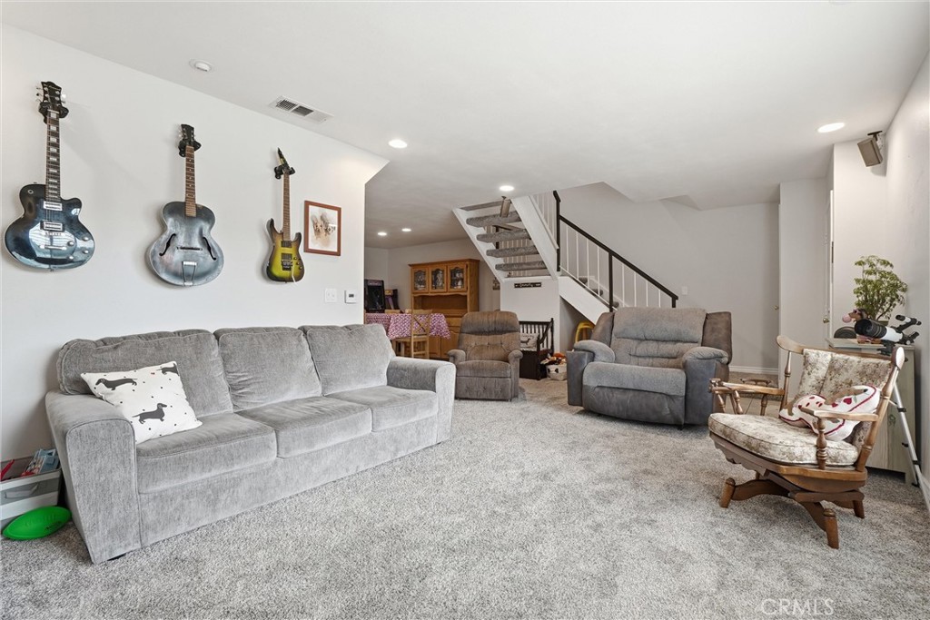 904 Cornwall Drive Anaheim, CA 92804 - Photo 2 of 42 a living room with furniture and wooden floor