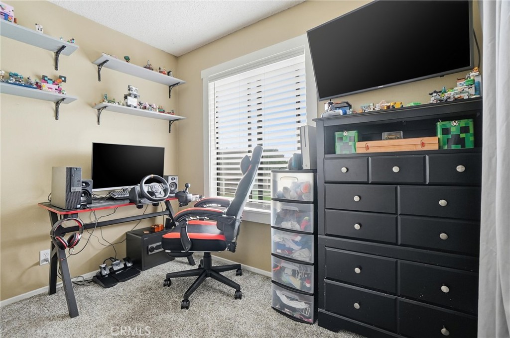 904 Cornwall Drive Anaheim, CA 92804 - Photo 23 of 42 a view of a workspace with furniture