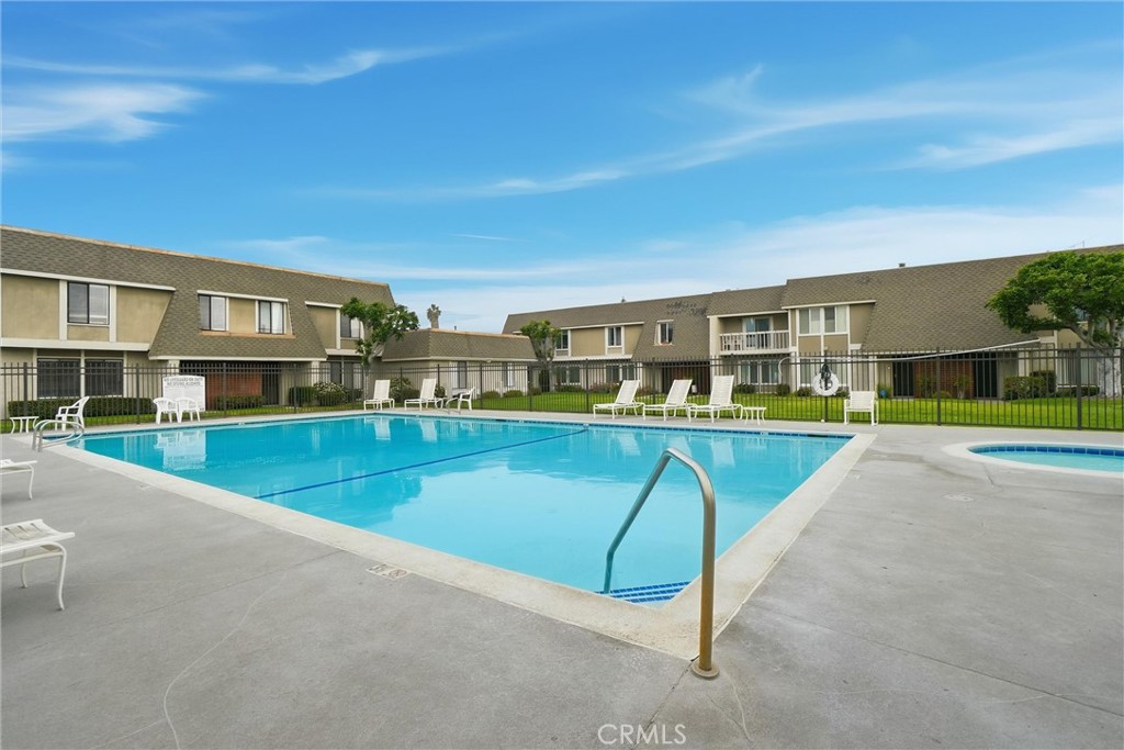 904 Cornwall Drive Anaheim, CA 92804 - Photo 32 of 41 a view of an swimming pool with a yard and seating area