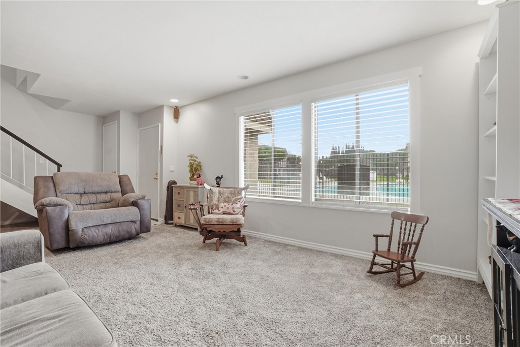 904 Cornwall Drive Anaheim, CA 92804 - Photo 6 of 41 a living room with furniture and a large window